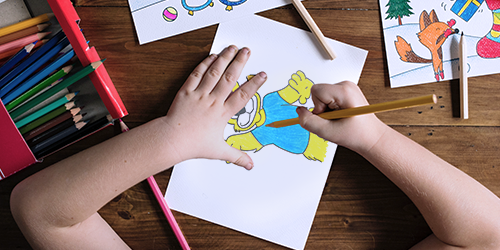Coloring in an image of Joe Bruin